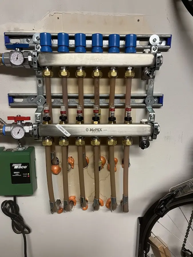 Plumber performing Gas Line Installation at a residential property in West York